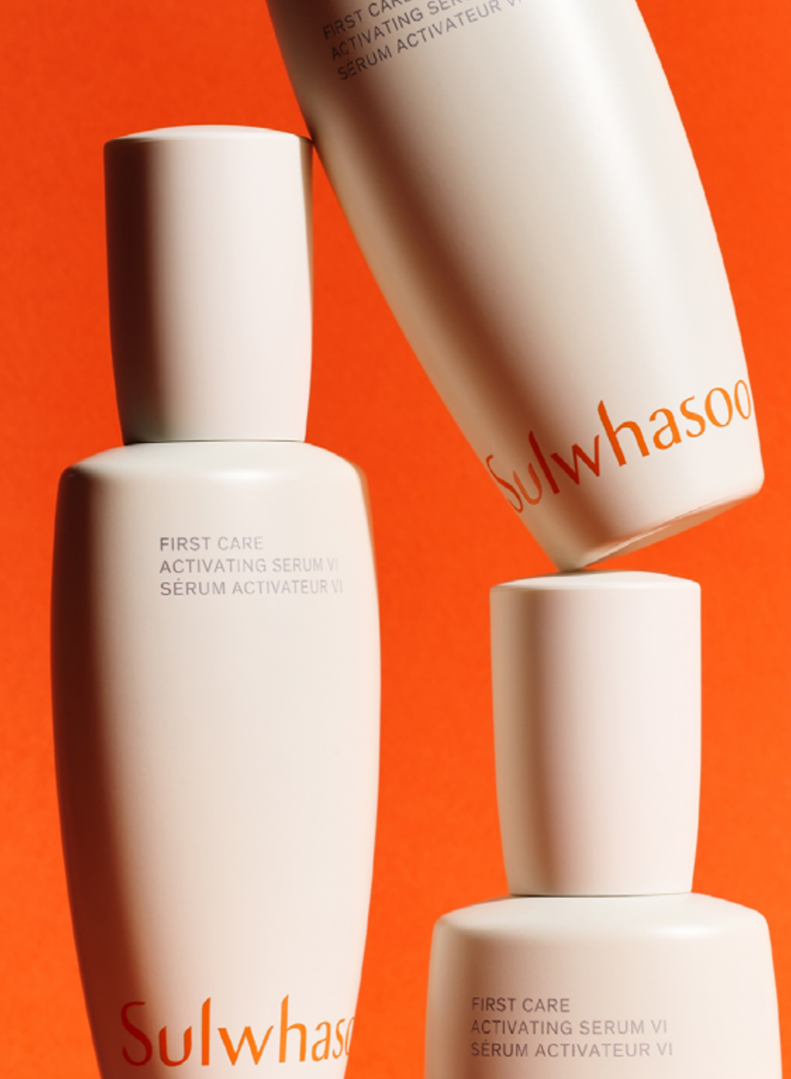 First Care Activating Serum set on an orange background